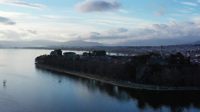 Aerial view of Ioannina city in Greece, Aslan Pasha Tzami, the lake with the island of Kyra Frosini or nissaki.