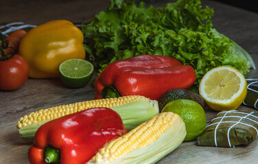 Plate of Latin American food made from corn wrapped in banana leaves, traditional food hallaca