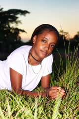 portrait of a teenager in with t-shirt on the grass