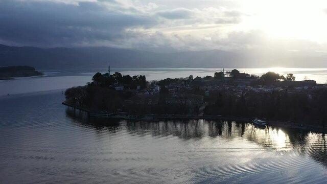 Aerial view of Ioannina city in Greece, Aslan Pasha Tzami, the lake with the island of Kyra Frosini or nissaki.