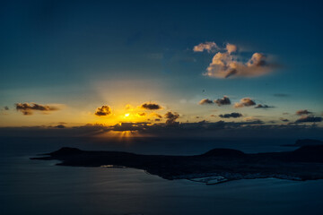 sunset over the island in the sea