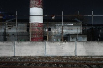 Obraz premium industrial factory in the evening