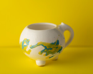 handmade ceramic mug with interesting design