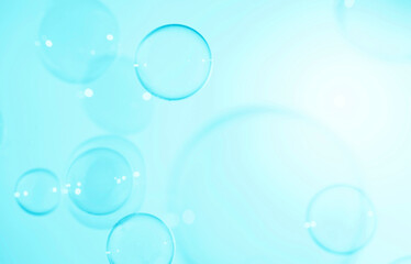 Beautiful Transparent Blue Soap Bubbles on White Background	