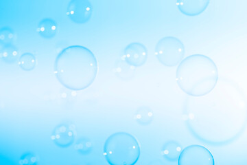 Beautiful Transparent Blue Soap Bubbles on White Background	