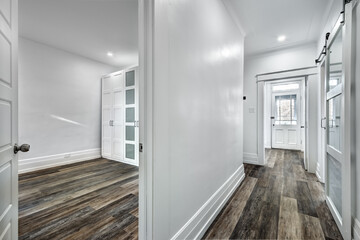 Empty beautiful old style modern renovated apartment in 2 floors Canadian house with nice equipped contemporary kitchen with appliances, stove, fridge, washer and dryer, new bathroom and powder room