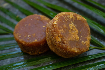  brown sugar with palm leaf base and blurred background