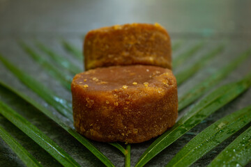  brown sugar with palm leaf base and blurred background