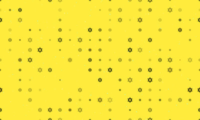 Seamless background pattern of evenly spaced black star of David symbols of different sizes and opacity. Vector illustration on yellow background with stars