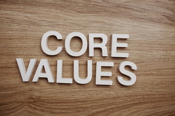 Core Values alphabet letters on wooden background