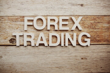 Forex Trading alphabet letters on wooden background
