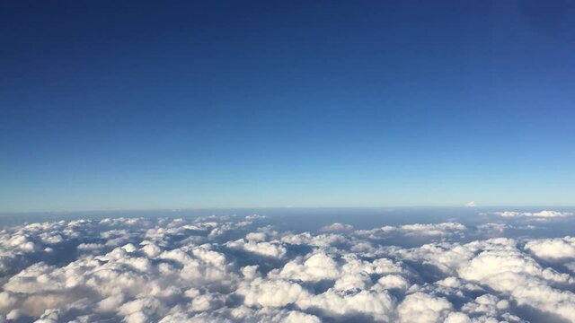 Footage time lapse white clouds were moving in the bright blue sky.