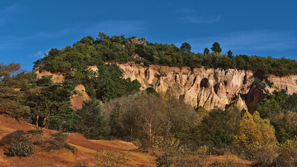 Stunning view of multi-colored ocher rock formations with orange and yellow colors at Colorado...