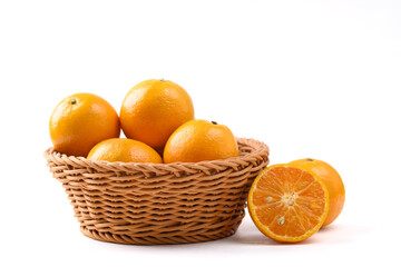 Fresh tangerine orange fruit in basket on white background, Tropical fruit