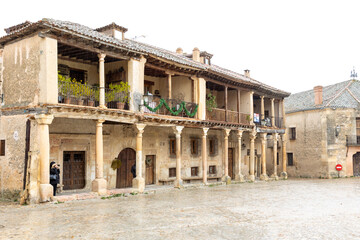 details of the buildings that surround the main square of the town of Pedraza in the province of Segovia