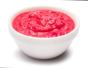 Horseradish red sauce in ceramic bowl isolated on white
