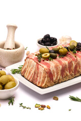 Traditional French terrine covered with bacon isolated on white background