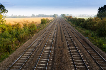 Fototapeta premium Railway lines disappearing in to distance