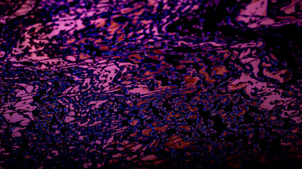 colored stains of gasoline oil on the water, iridescence