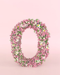 Creative letter O concept made of fresh Spring wedding flowers. Flower font concept on pastel pink background..