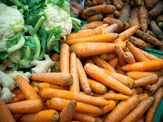 Cauliflower and carrots in the supermarket.