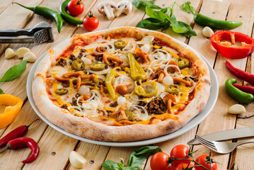 italian pizza on the wooden background