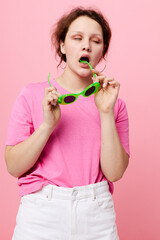 beautiful woman with green glasses decoration gesture with his hands Studio