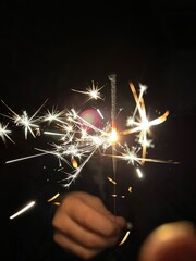 sparkler in hand