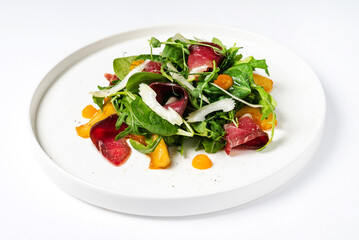 fresh spring salad on the white background