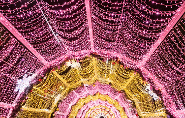 tunnel made of a luminous garland