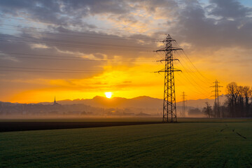 Sonnenaufgang über Agrarflächen