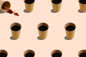 Black coffee in paper cup on beige background. Seamless repeating pattern.