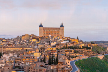 Fototapeta na wymiar Early hours of the medieval city of Toledo in Castilla La Mancha, Spain. View from the Ermita del Valle. Alzacar and Santa Iglesia Primada.