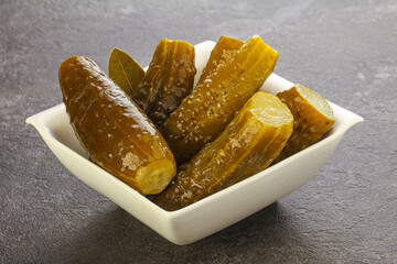 Marinated pickled cucumbers in the bowl
