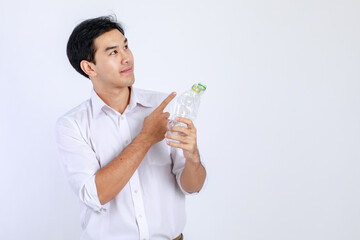 Handsome, friendly face asian man smile happy, dressed casually campaign say no plastic, reducing plastic, reducing global warming, studio light shot isolated on white background. Environment concept