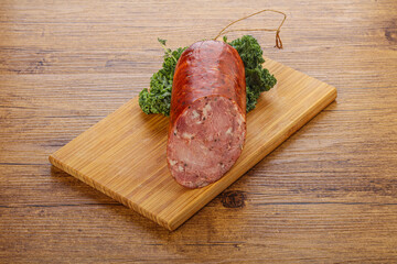 Pork ham sausage over board