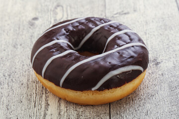 Glazed sweet tasty chocolate donut