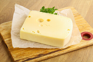 Maasdam cheese over the board