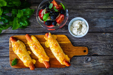 Sausage rolls - pork sausages wrapped on puff pastry 