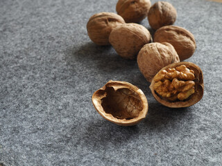 Whole walnuts on dark board, Walnut kernels . Healthy food nuts.