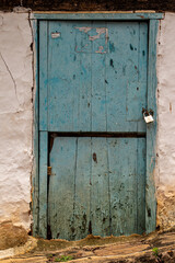 Beautiful old blue wooden door in Barichara, Colombia.