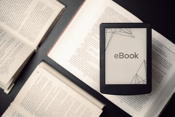 Readers. Digital e book, library reader tablet with books on dark background. Ebook, e learning...