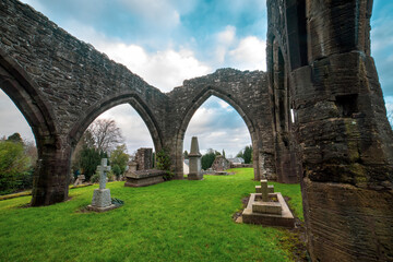 Fototapeta na wymiar Muthill Old Church and Tower. Scotland. U.K is a 12th century medieval church with a tall Romanesque tower, all that remains of an important early Christian site linked to the cathedral at Dunblane.