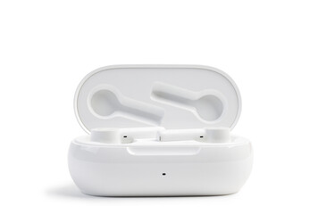 Closeup white TWS (true wireless stereo) earbuds in case isolated on white background. Front view.