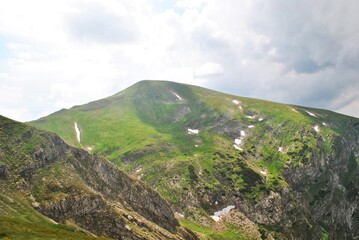 Fototapeta premium Beautiful mountain landscape. A trail leading through the Tatra National Park.