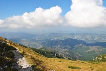 Fototapeta na wymiar Beautiful mountain landscape. A trail leading through the Tatra National Park.
