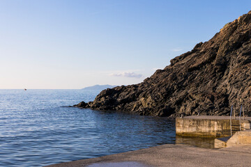rocky bathing beach in small coastal village Patresi on Elba island in Italy