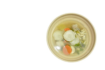 boiled radish with carrot and chicken soup on bowl