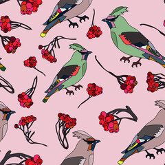 Seamless vector pattern with winter bird and rowan berries can be used
as decor, background, wrapping paper, textile, fabric motive, etc.