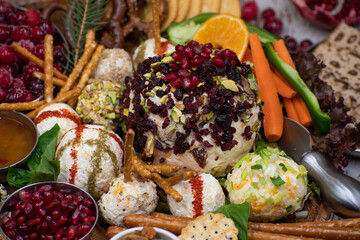 Close up cheese balls as part of a festive cheese board